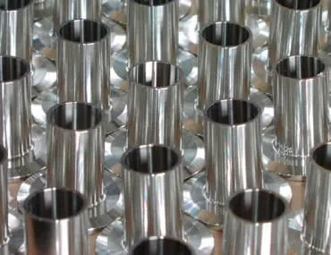 Electropolished nickel alloy fittings with a bright, uniform finish at Harrison Electropolishing