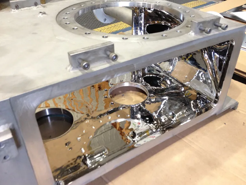 Mirror-polished stainless steel vessel interior at Harrison Electropolishing