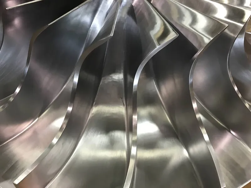 Polished nickel alloy impeller finished at Harrison Electropolishing
